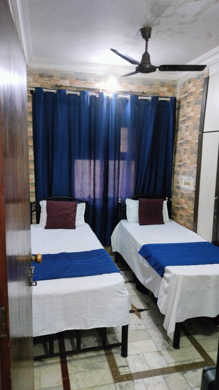 Raj Residency Classic PG room